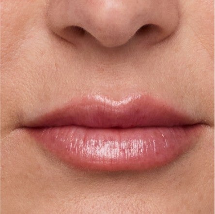 Close up of model's lips.