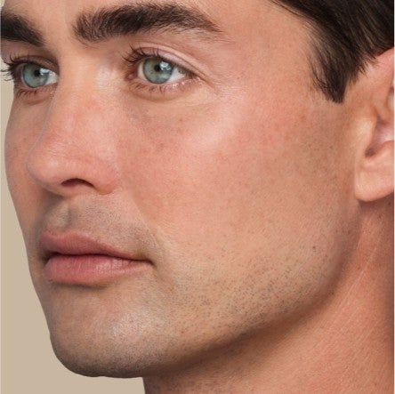 Close up of model's jawline.